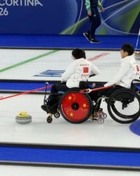 中欧体育官方入口-米兰冬残奥会中国轮椅冰壶队首战告捷｜快讯